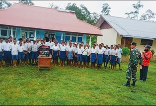 Sekolah Perbatasan RI-PNG Terima Genset Bantuan Satga Yonif 411  Kostrad