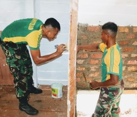 Satgas Pamtas Kostrad Bantu Bangunan Koperasi