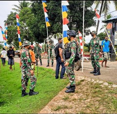 Prajurit�Yonif 125/SMB Bersama Warga Hiasi Kampung Toray Hiasi Bendera dan Umbul-Umbul