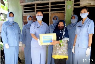 Yonko 462 Paskhas Gelar Do�a Bersama dan Bagikan Sembako ke Warga Kurang Mampu