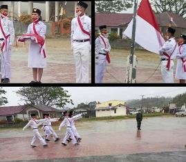 Diguyur Hujan dan Angin Kencang, Upacara Penurunan Bendera di Onan Ganjang Berlangsung Sukses