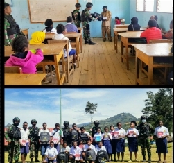 TNI Bagikan Tas dan Perlengkapan Sekolah Saat Anjangsana di SMPN 1 Tiom